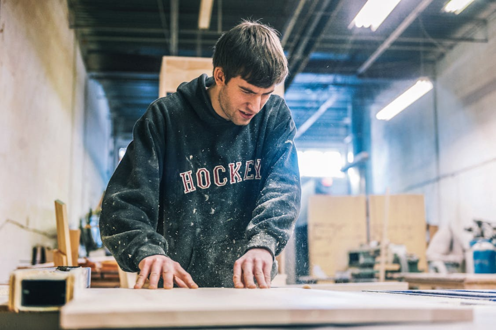 A person working on a cutting table 