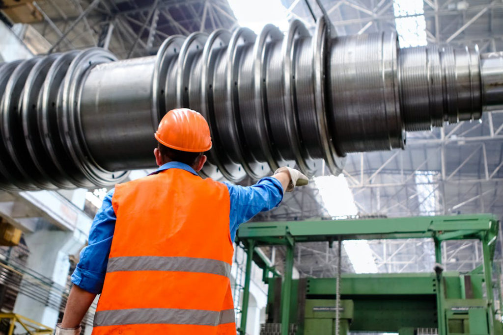  A skilled laborer at an industrial facility handling machinery