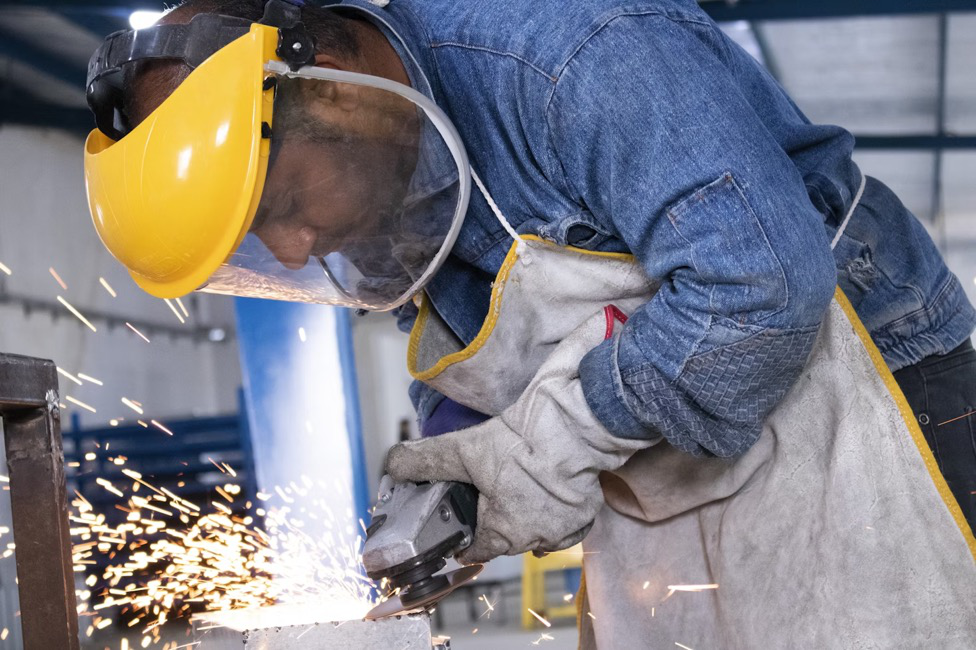 A person using a grinder