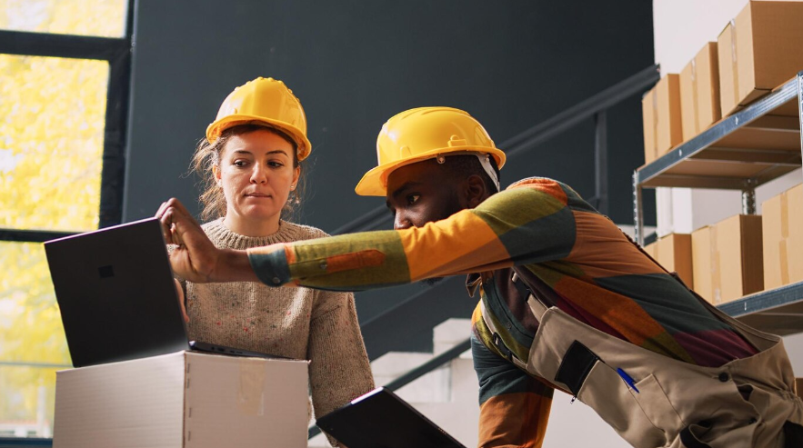 a delivery team reviewing shipment logistics